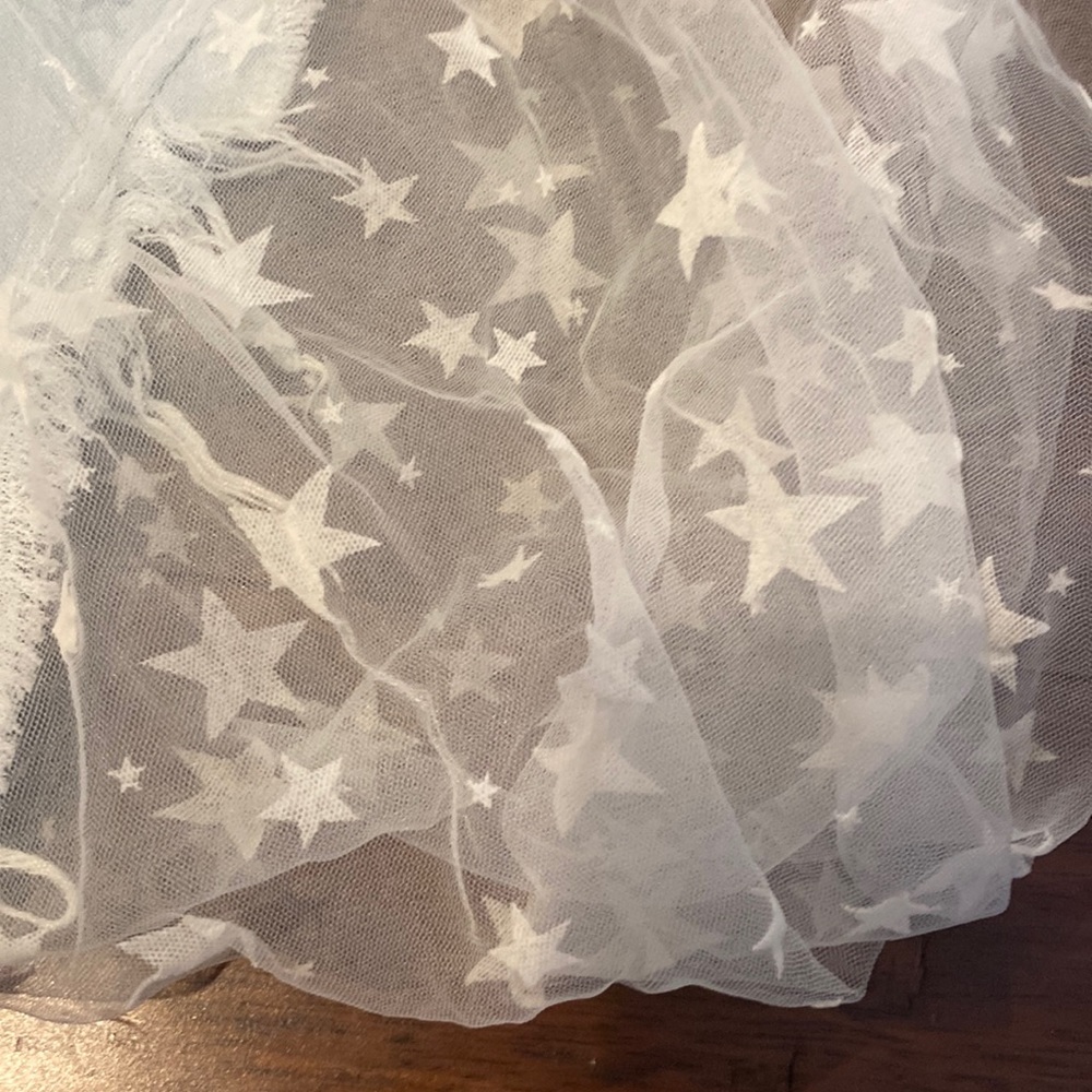 Star jeans with lace cutouts